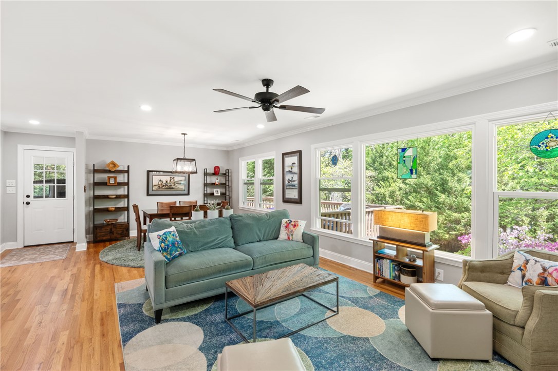 209 Manley Drive Clemson, SC 29631 - Photo 13 of 44 This inviting living space features gleaming wood floors and abundant natural light.