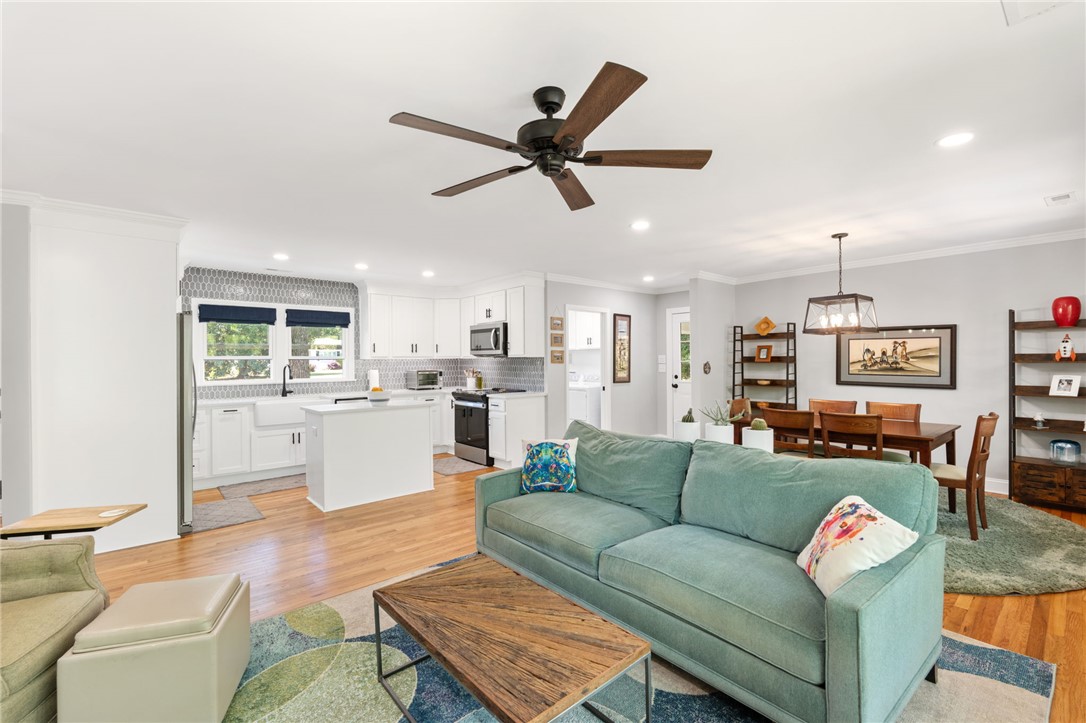 209 Manley Drive Clemson, SC 29631 - Photo 14 of 44 This inviting space combines comfortable living with a well-appointed kitchen and dining area.