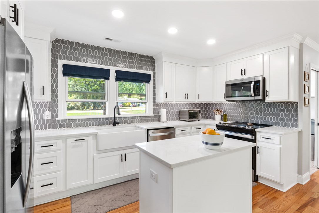 209 Manley Drive Clemson, SC 29631 - Photo 15 of 44 This bright kitchen features sleek appliances and ample counter space, perfect for culinary endeavors.