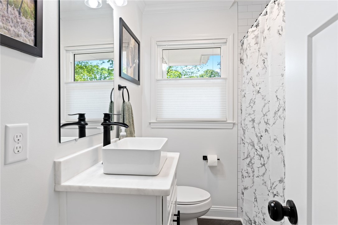 209 Manley Drive Clemson, SC 29631 - Photo 22 of 44 This bright bathroom features crisp white finishes and thoughtful design for daily routines.