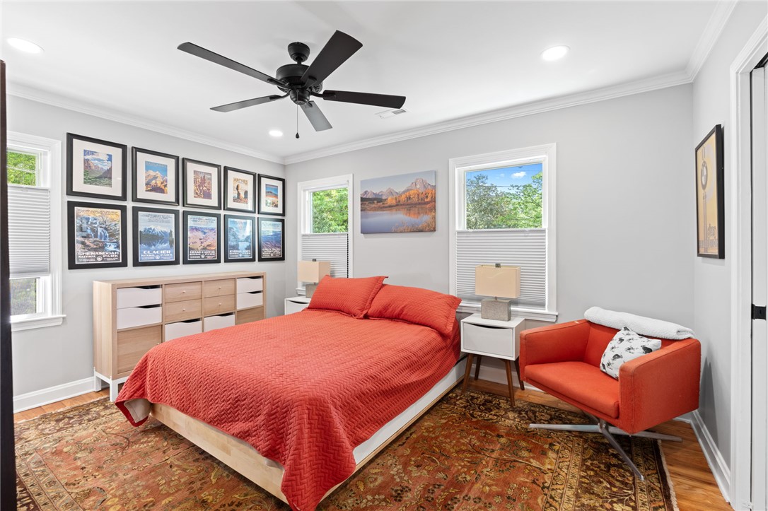 209 Manley Drive Clemson, SC 29631 - Photo 23 of 44 This cozy bedroom offers comfort and natural light, creating a serene personal retreat.