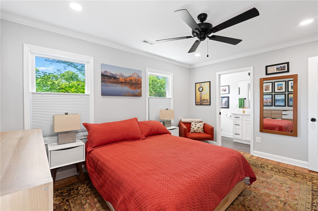 209 Manley Drive Clemson, SC 29631 - Photo 24 of 44 This spacious bedroom offers a tranquil retreat with ample natural light.