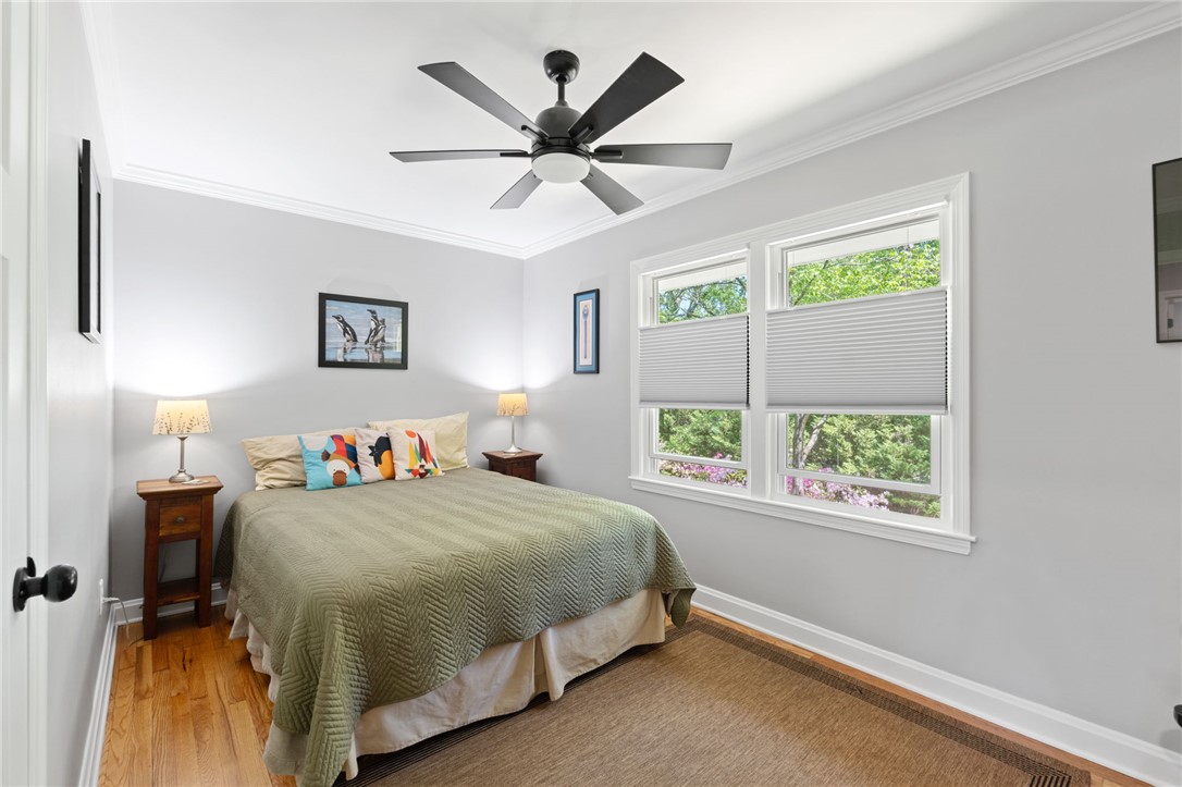 209 Manley Drive Clemson, SC 29631 - Photo 27 of 44 This cozy bedroom offers a tranquil retreat with ample natural light and thoughtful design.