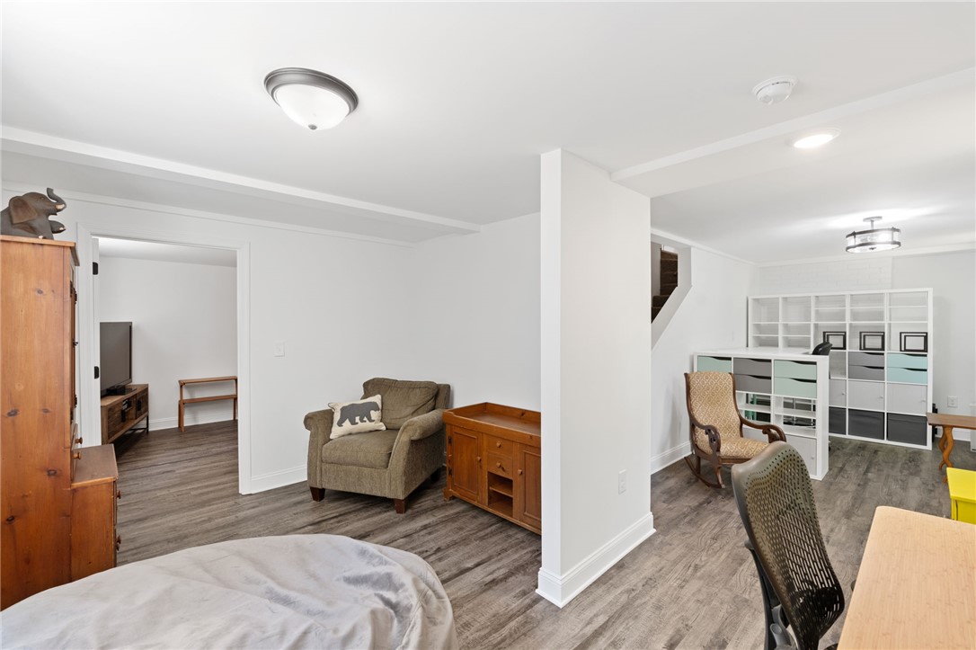 209 Manley Drive Clemson, SC 29631 - Photo 30 of 44 This versatile living space features modern flooring and a clean aesthetic, ready for personalized touches.