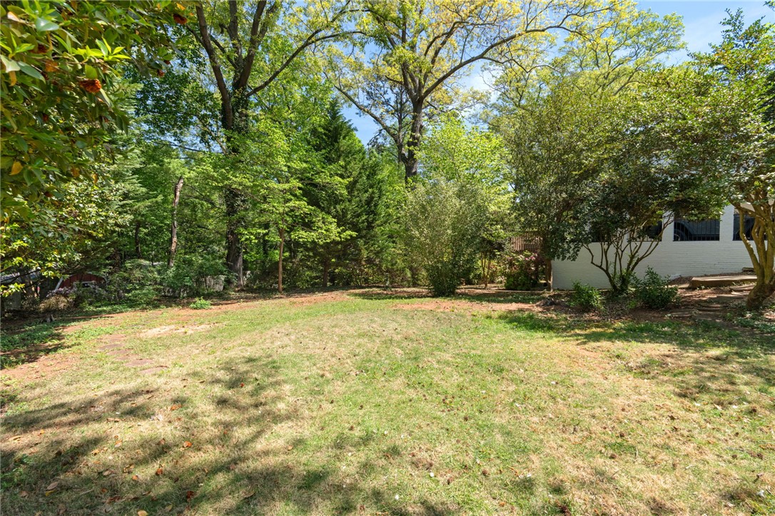 209 Manley Drive Clemson, SC 29631 - Photo 40 of 44 A spacious yard with mature trees provides ample outdoor living space.