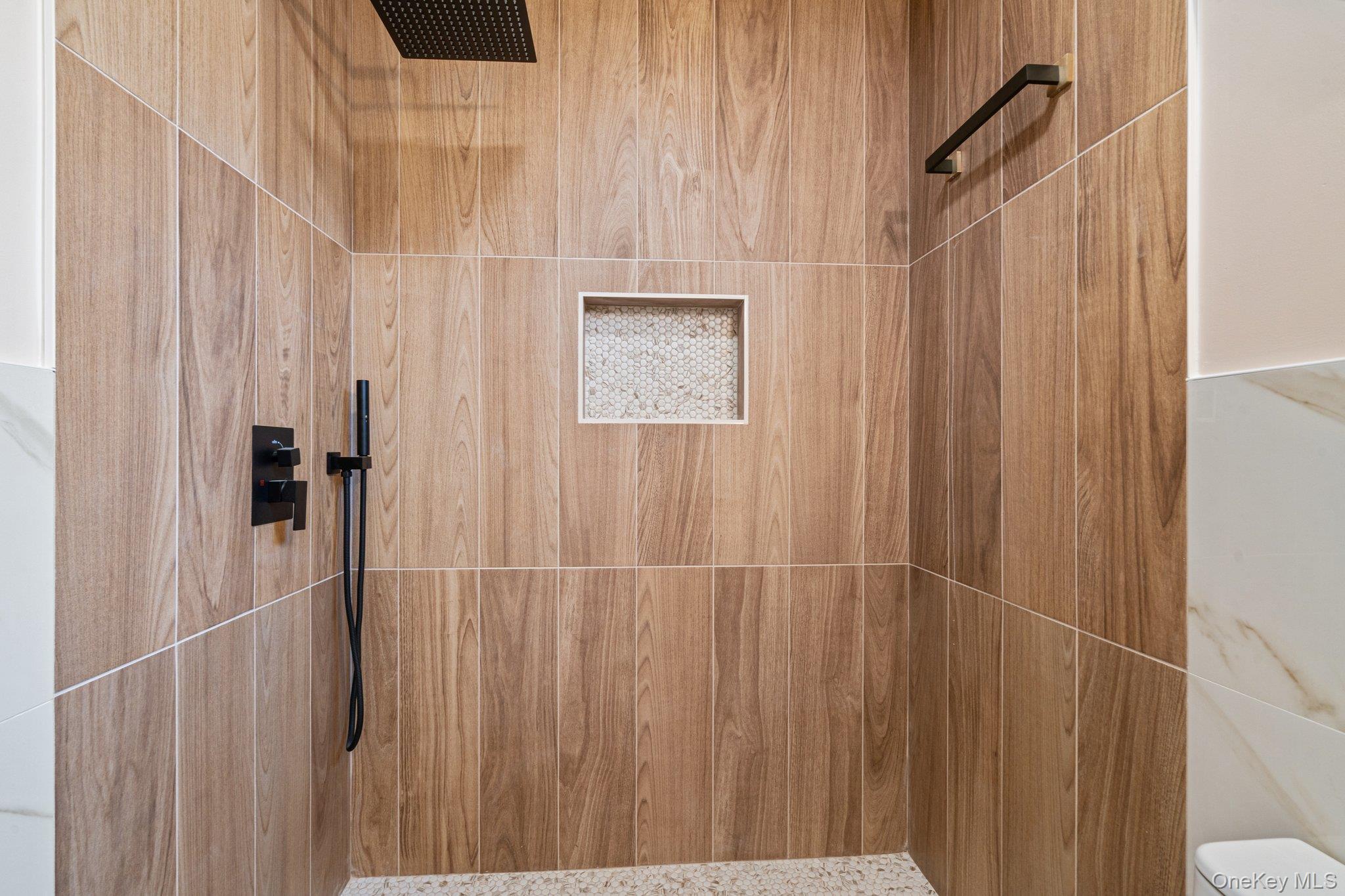 6 Doe Path Coram, NY 11727 - Photo 22 of 48 Bathroom with a tile shower and toilet