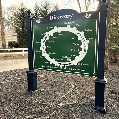 a view of a street with a park