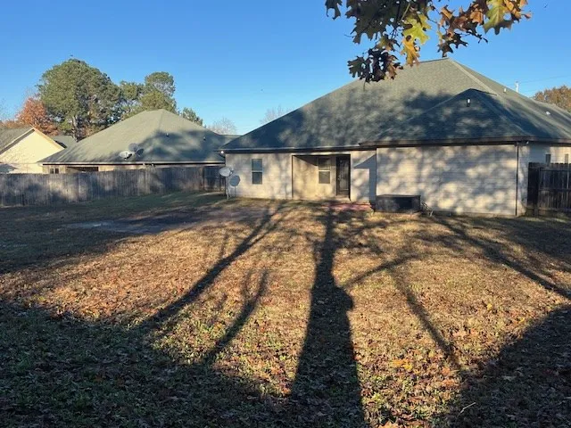 a view of a yard with an outdoor space