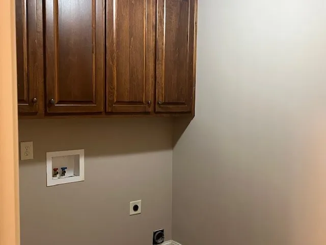 a kitchen with stainless steel appliances granite countertop a refrigerator a sink and a stove