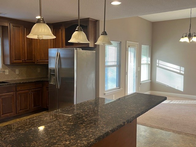 6 Summershade Court Fort Mitchell, AL 36856 - Photo 8 of 12 a kitchen with stainless steel appliances granite countertop a refrigerator a sink and a stove