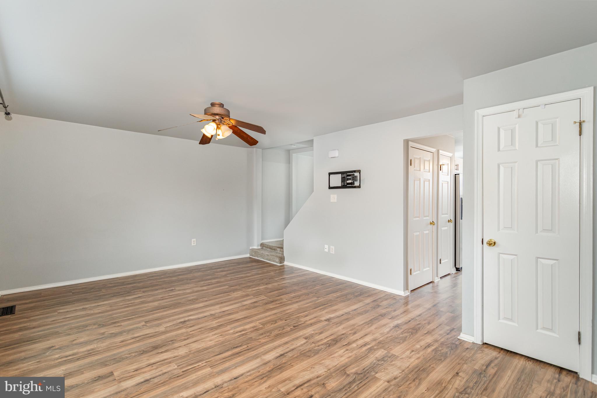 17 Mall Road Etters, PA 17319 - Photo 3 of 25 wooden floor in an empty room with a window