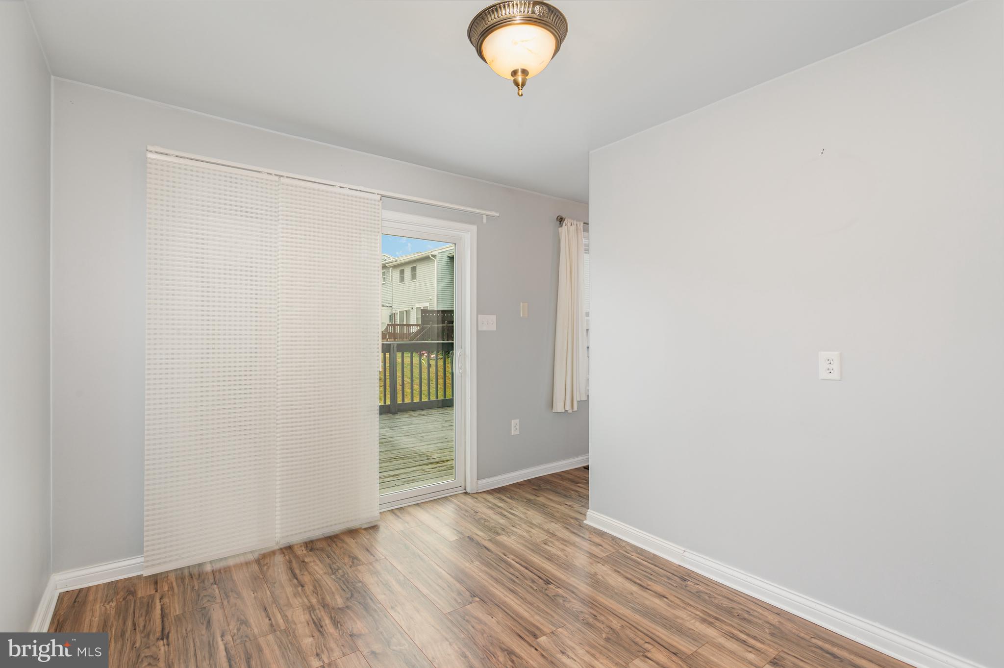 17 Mall Road Etters, PA 17319 - Photo 5 of 25 a view of empty room with wooden floor and fan