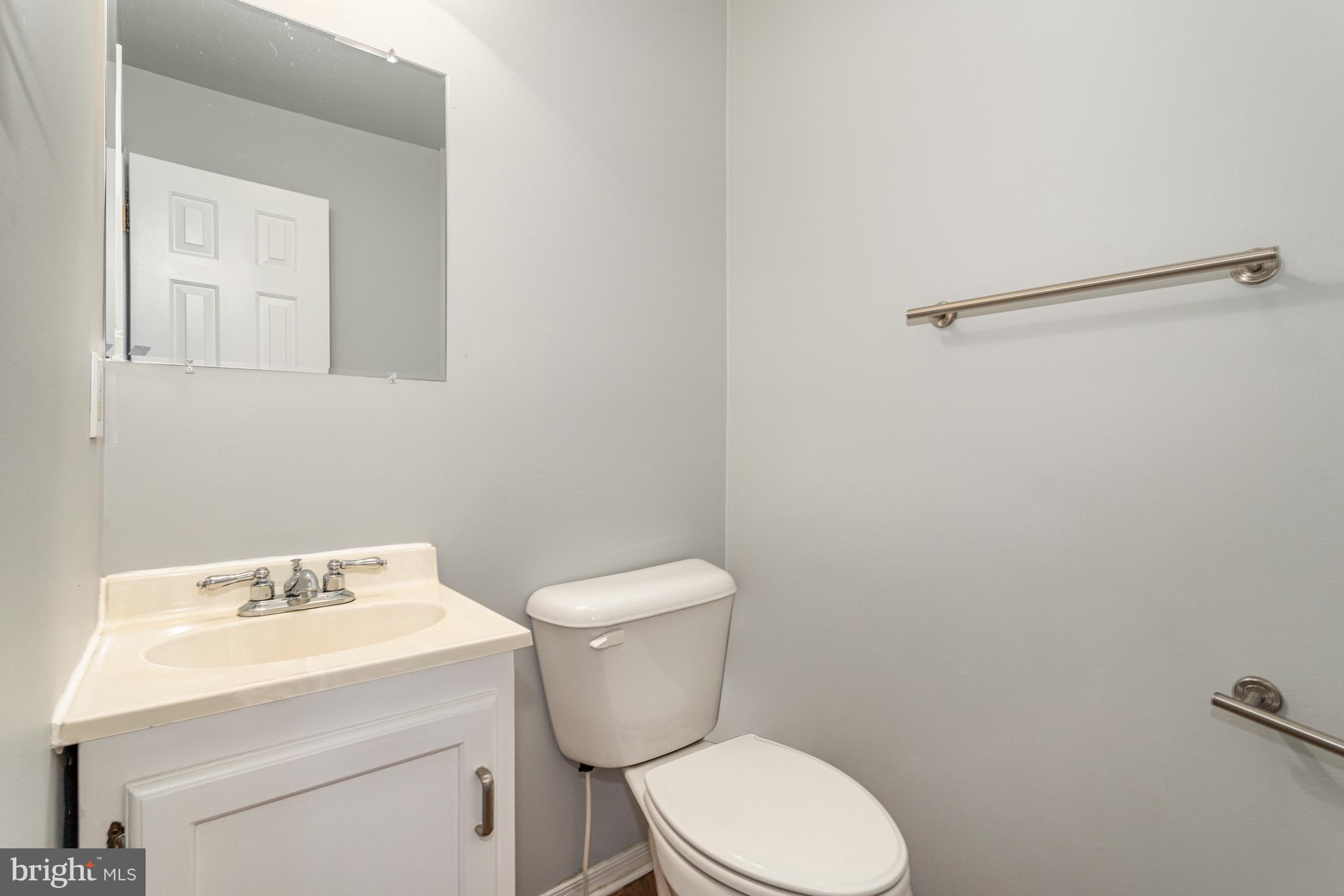 17 Mall Road Etters, PA 17319 - Photo 9 of 25 a white toilet sitting next to a bathroom sink