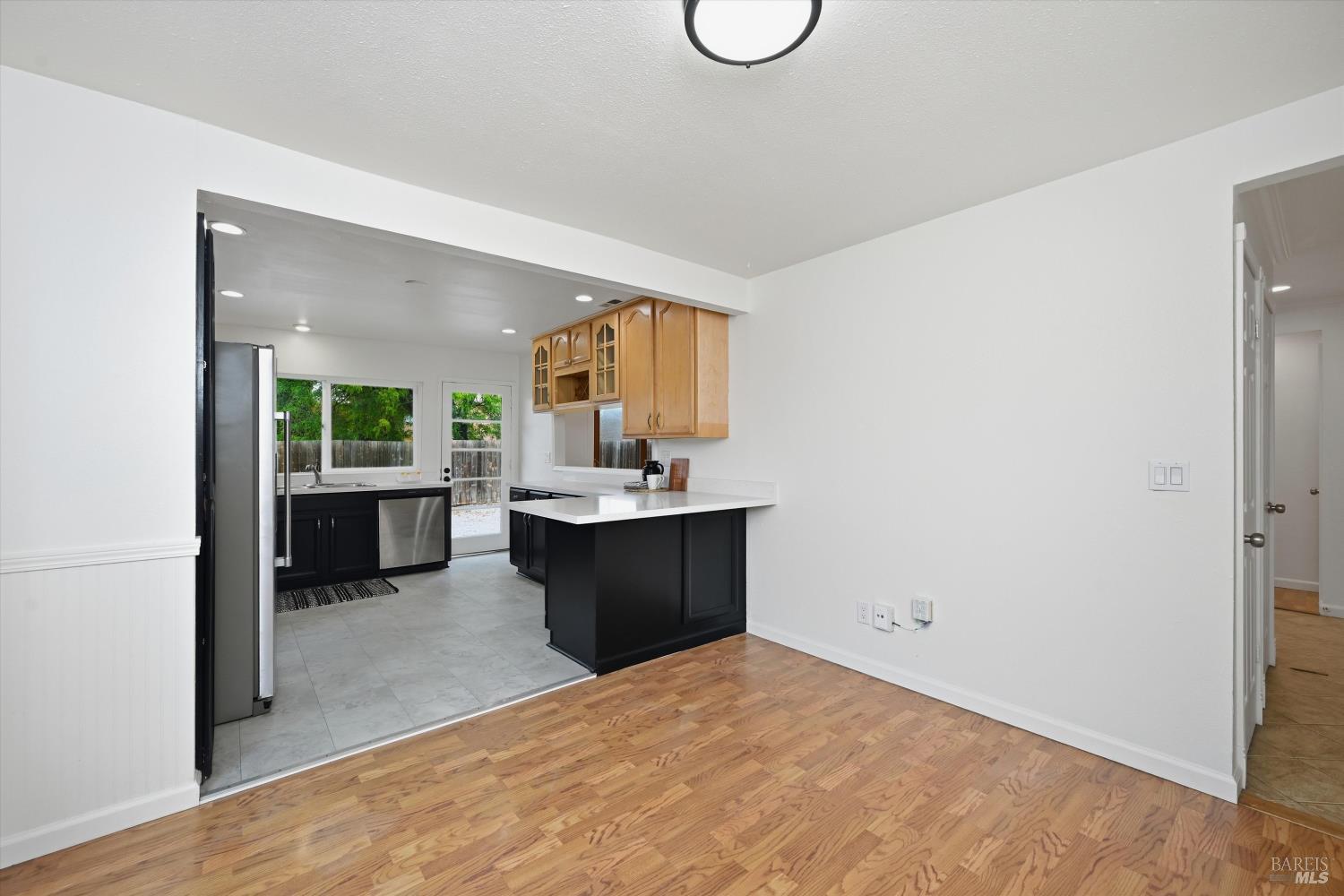 7930 Becky Court Rohnert Park, CA 94928 - Photo 12 of 33 a view of a kitchen with a sink cabinets and a window