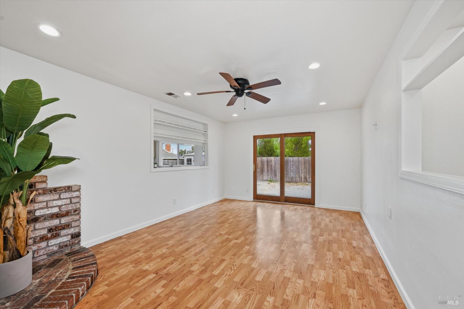 7930 Becky Court Rohnert Park, CA 94928 - Photo 14 of 33 a view of empty room with wooden floor