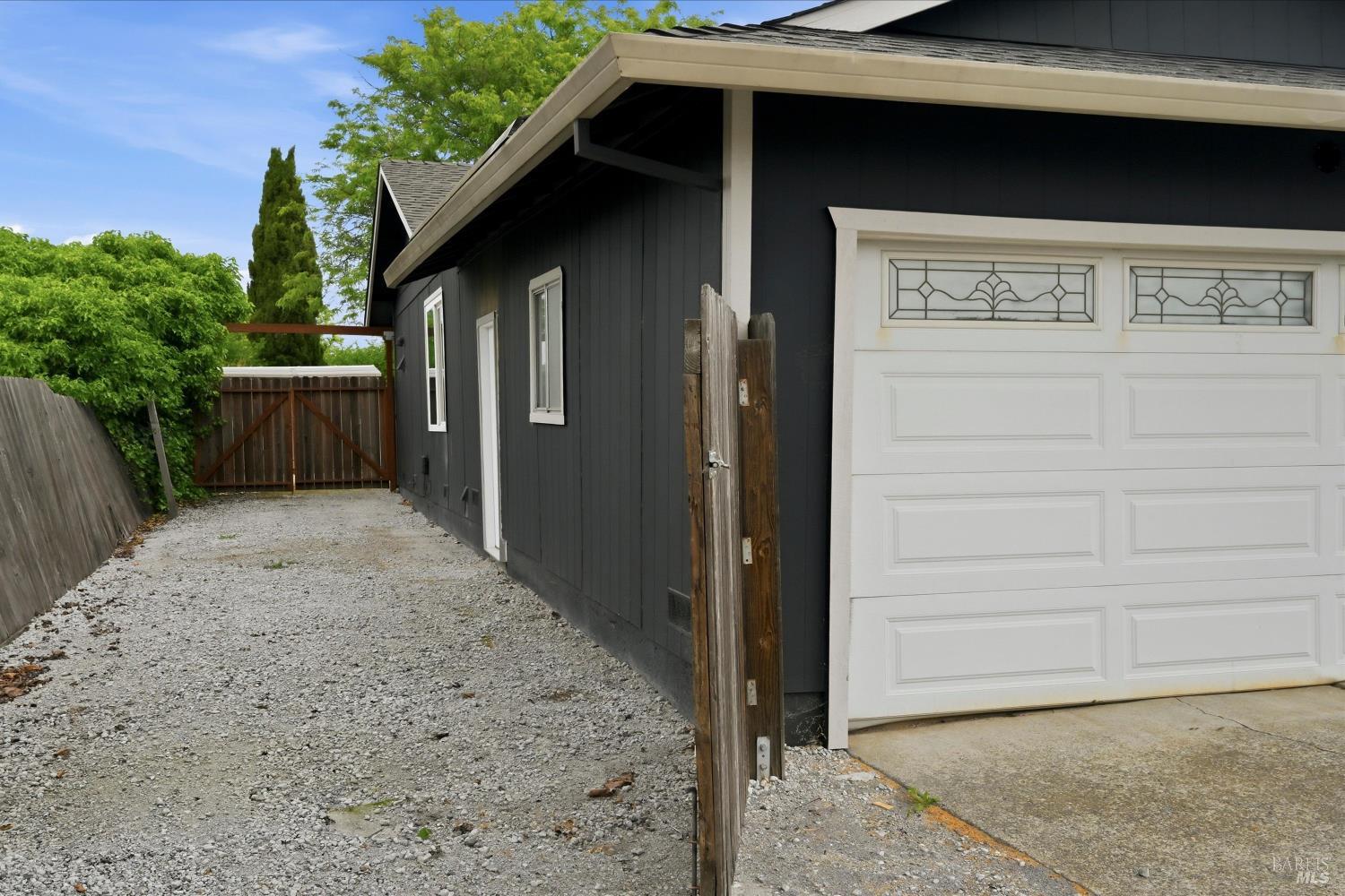 7930 Becky Court Rohnert Park, CA 94928 - Photo 26 of 33 a front view of a house with a yard