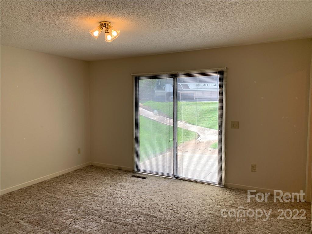 954 Old Charlotte Road Southwest Concord, NC 28027 - Photo 8 of 15 an empty room with a window