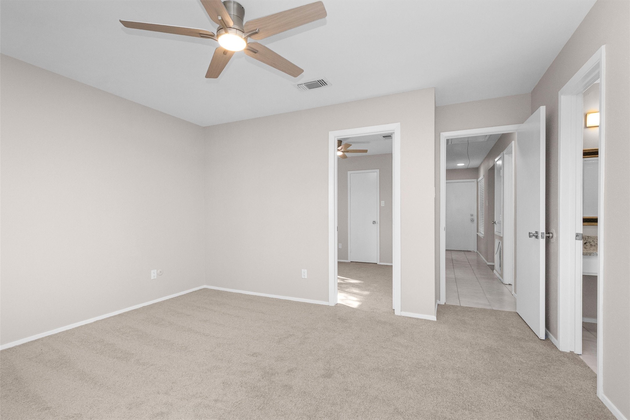 21030 Rivershadows Lane Spring, TX 77388 - Photo 13 of 38 an empty room with closet and a ceiling fan