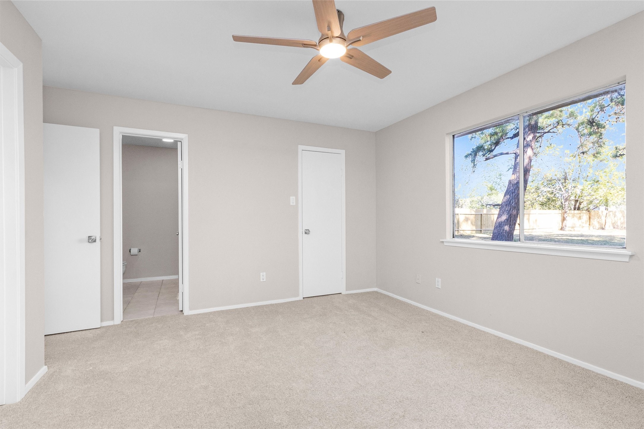 21030 Rivershadows Lane Spring, TX 77388 - Photo 14 of 38 a view of an empty room with a window