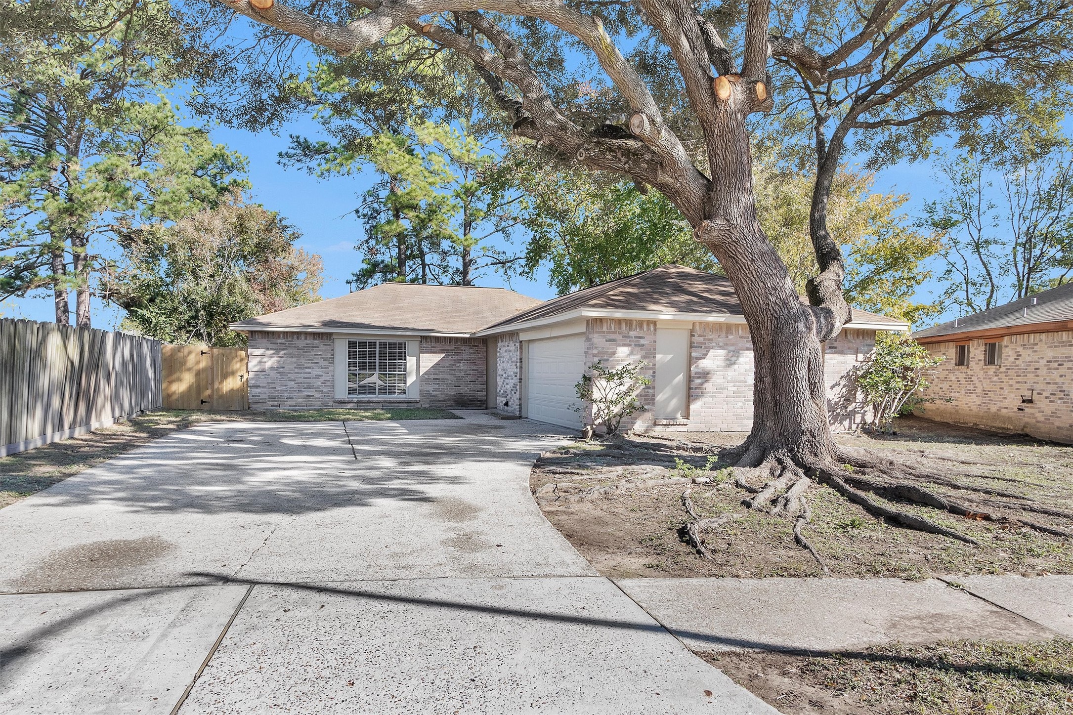 21030 Rivershadows Lane Spring, TX 77388 - Photo 2 of 38 a front view of a house with a yard
