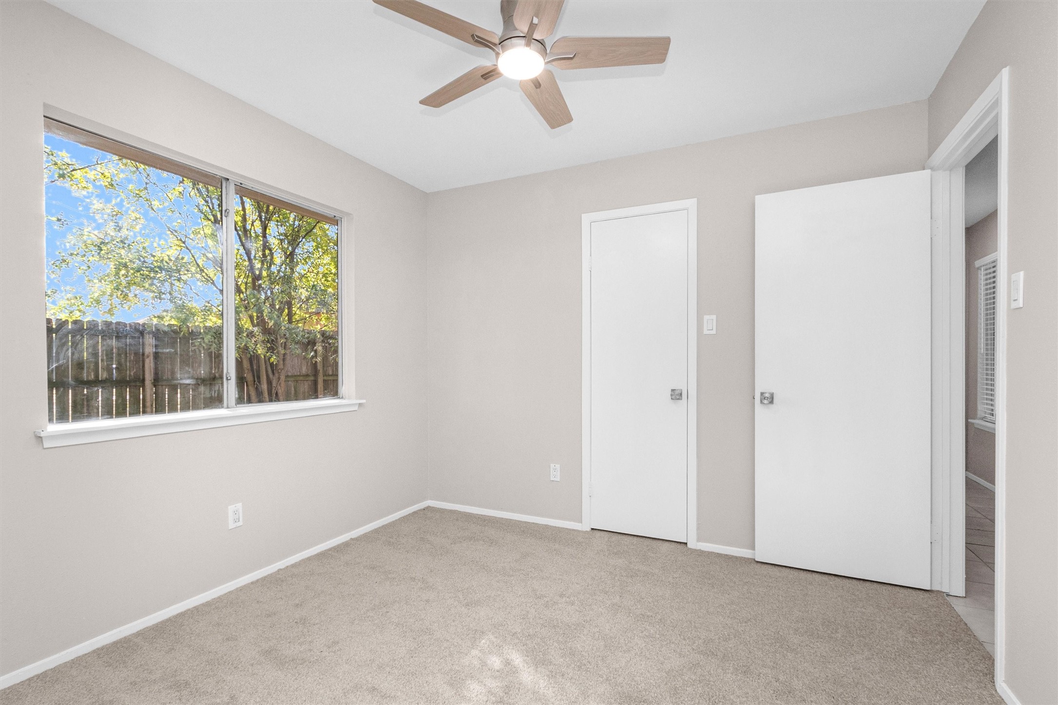 21030 Rivershadows Lane Spring, TX 77388 - Photo 22 of 38 a view of an empty room with a window