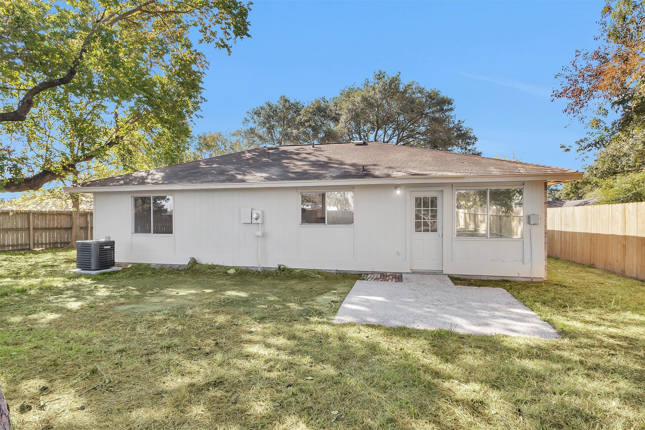21030 Rivershadows Lane Spring, TX 77388 - Photo 25 of 38 a view of a house with backyard and a tree