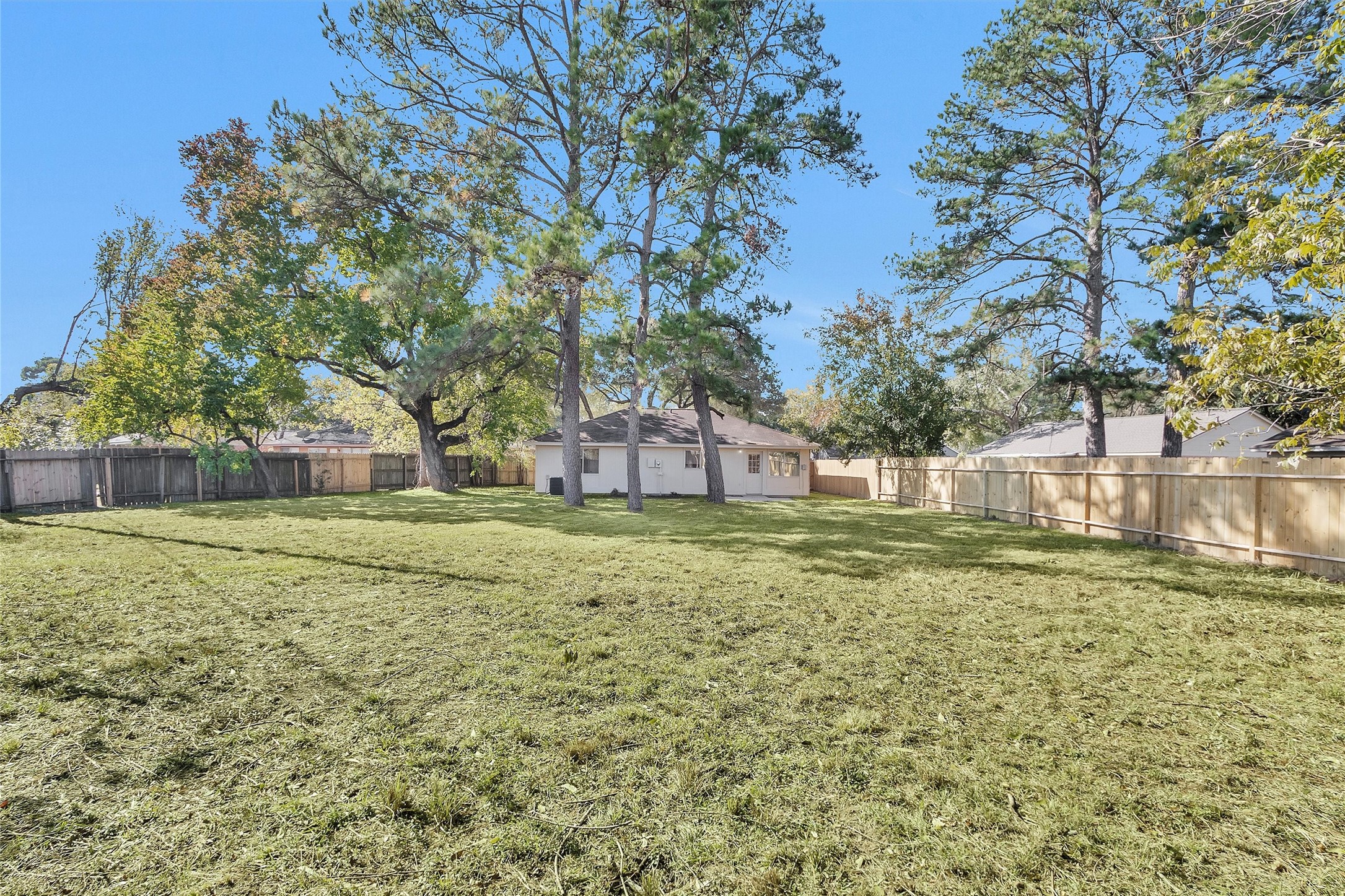 21030 Rivershadows Lane Spring, TX 77388 - Photo 29 of 38 a view of a house with a yard
