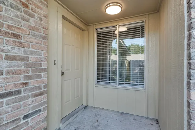 a view of a bathroom with a window