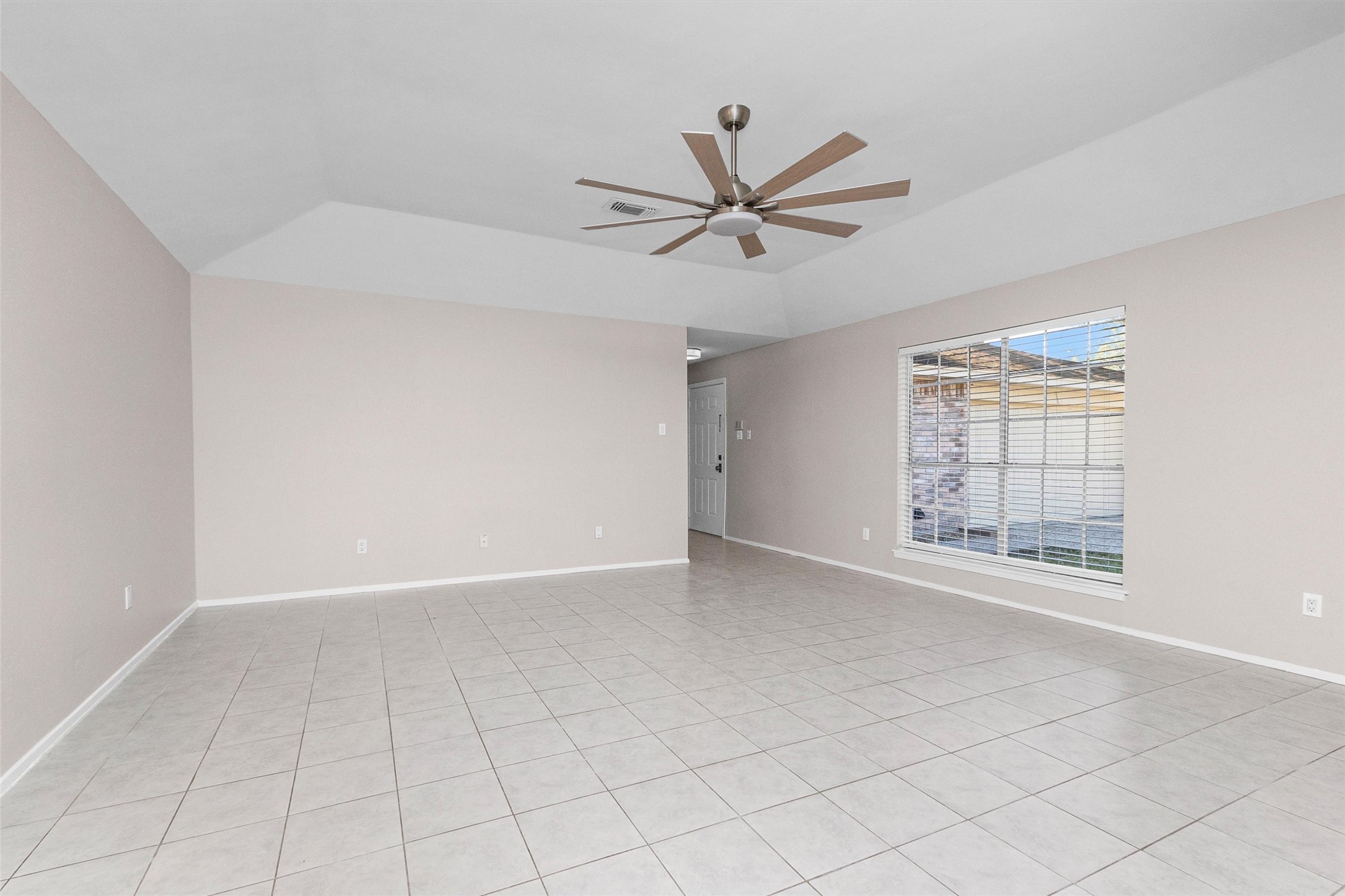 21030 Rivershadows Lane Spring, TX 77388 - Photo 6 of 38 a view of an empty room with a window