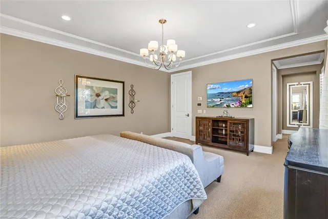 a bedroom with a bed and a fireplace