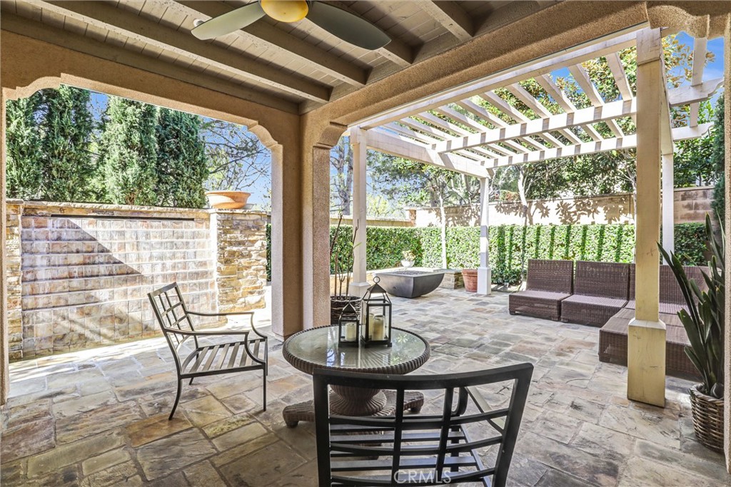 59 Rossmore Irvine, CA 92620 - Photo 34 of 45 a view of a porch with furniture and wooden floor