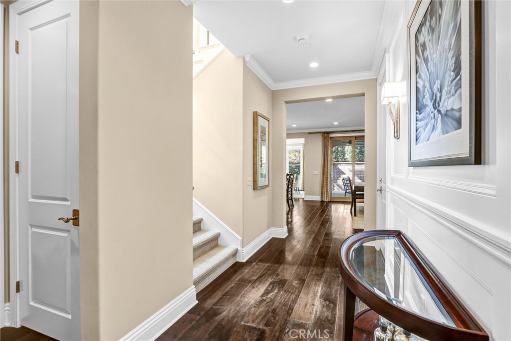 59 Rossmore Irvine, CA 92620 - Photo 6 of 45 a view of a hallway with furniture and staircase