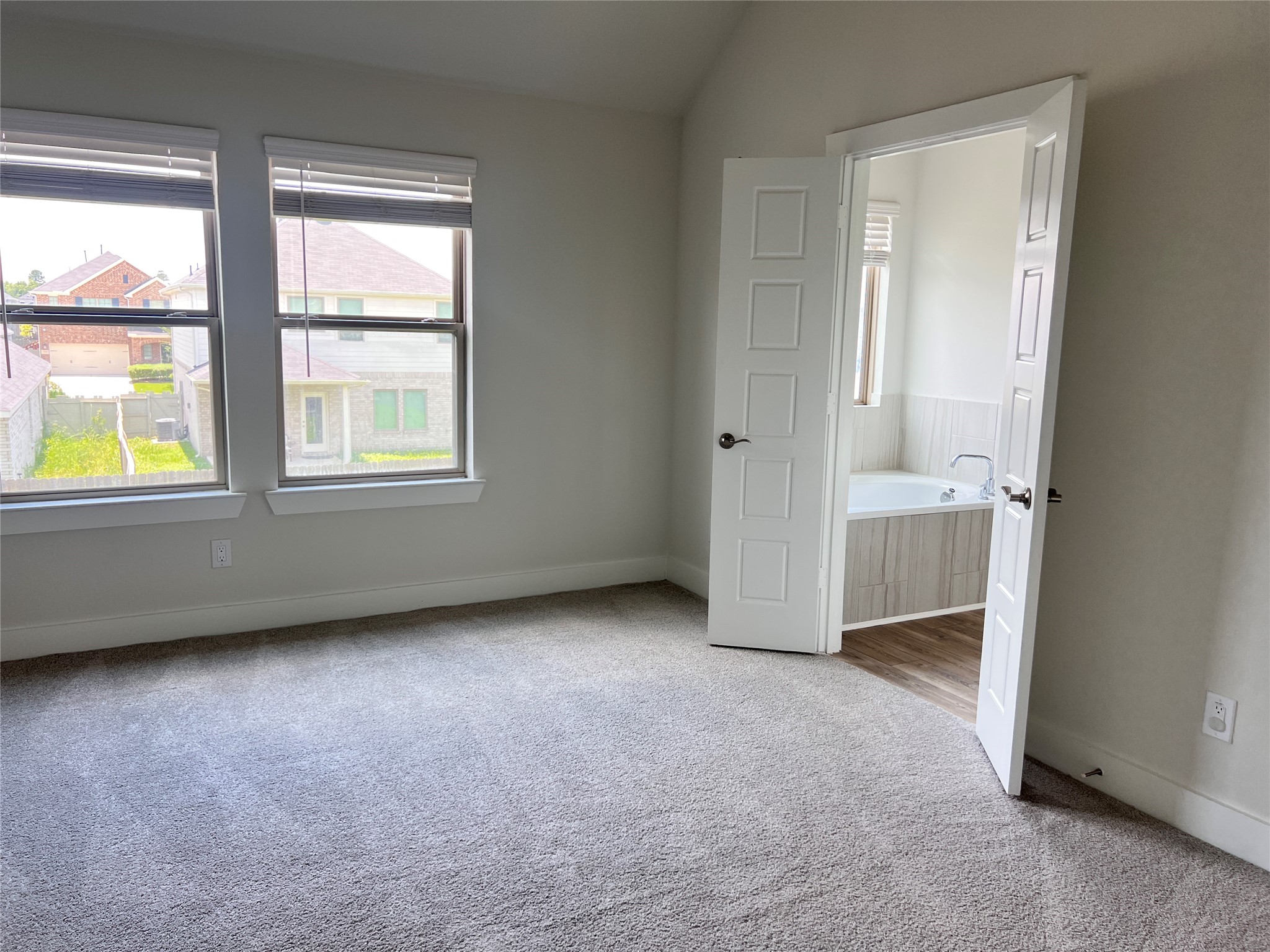 10638 Whitejacket Conroe, TX 77385 - Photo 22 of 25 an empty room with a window
