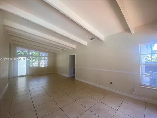 a bathroom with a sink toilet and mirror