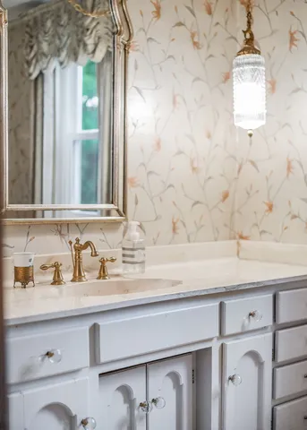 a bathroom with a sink a toilet and a bathtub