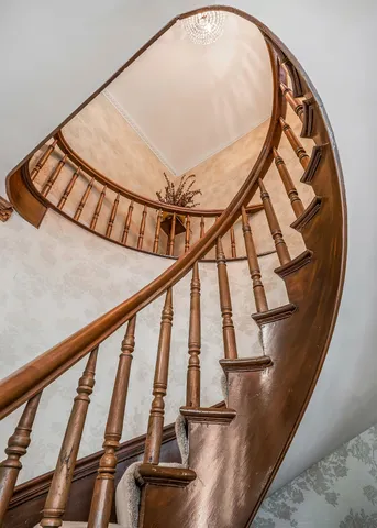 a bed room with a bed and a window