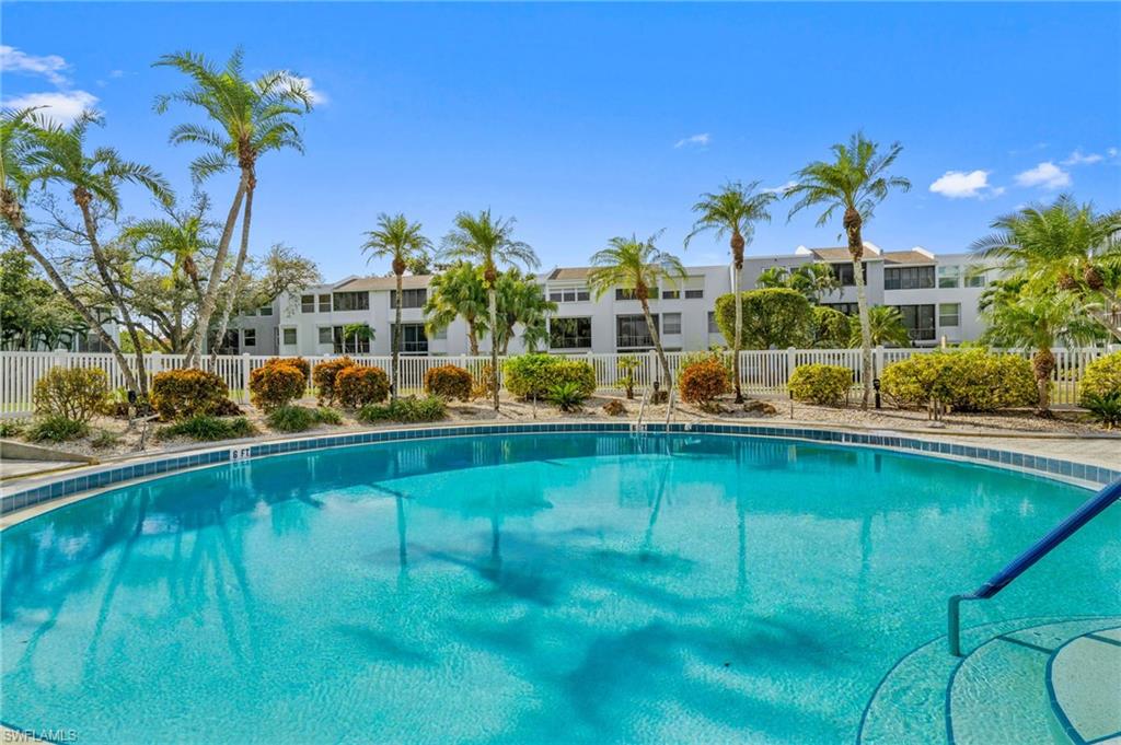 5959 Winkler Road, Unit 114 Fort Myers, FL 33919 - Photo 19 of 20 a view of a house with a swimming pool