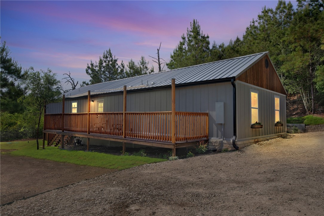 201 Winfield Thicket Road Bastrop, TX 78602 - Photo 1 of 1 a view of a house with a yard and wooden fence