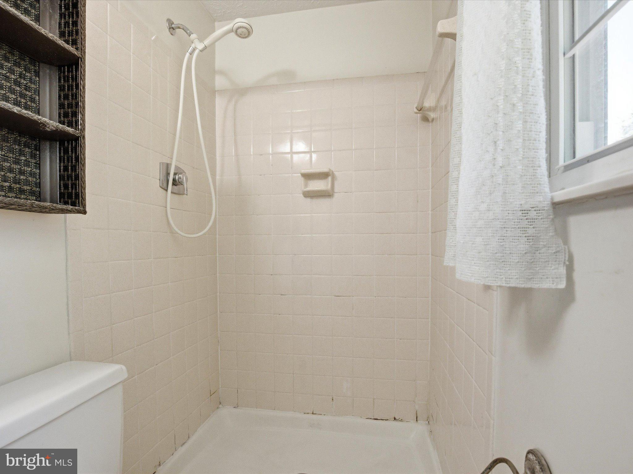 6314 West Vein Road Bowie, MD 20720 - Photo 23 of 28 a bathroom with a shower