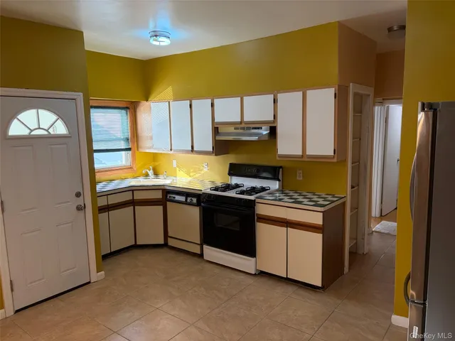 a bathroom with a toilet sink and shower