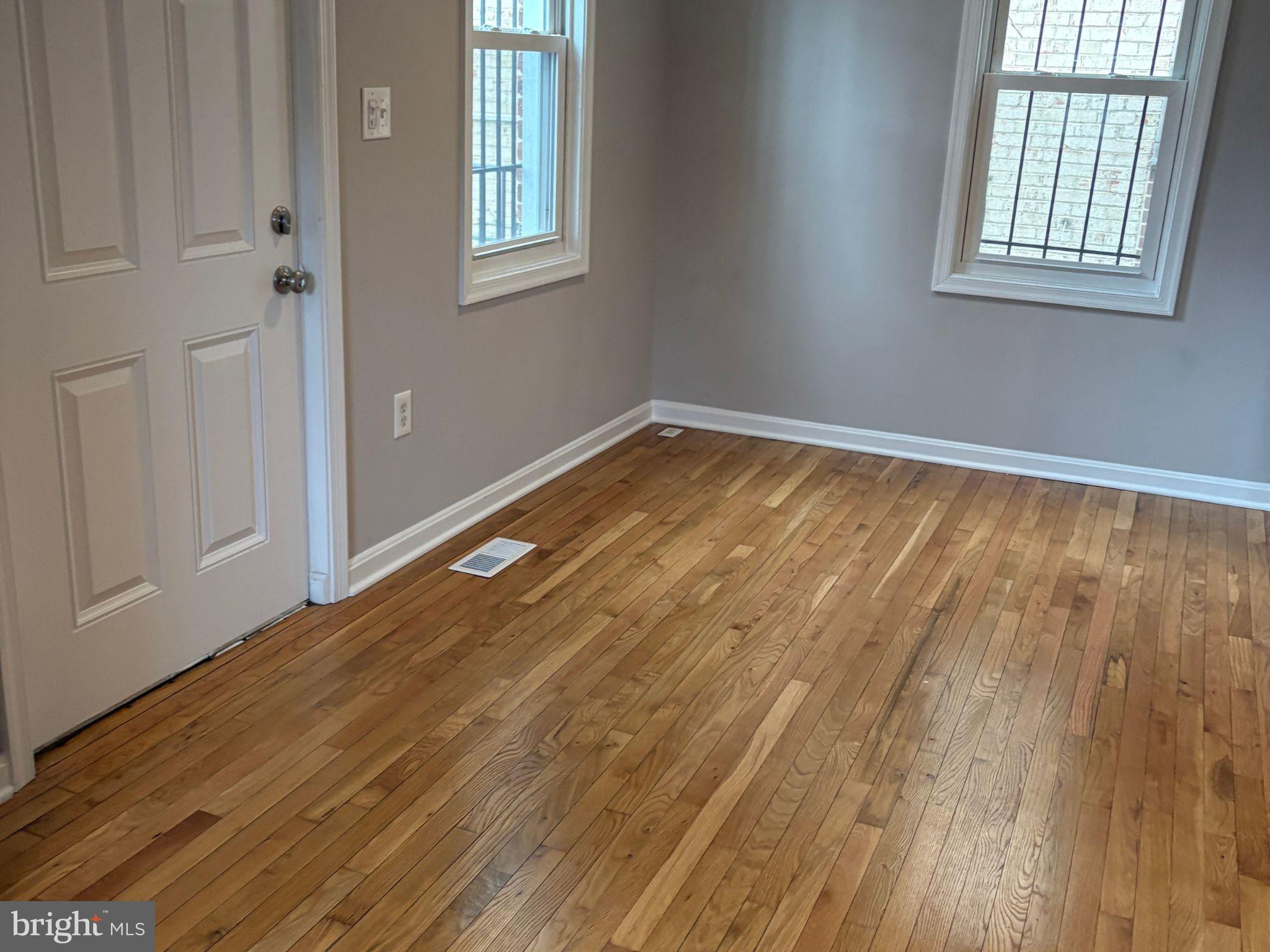 5126 Call Place Southeast Washington, DC 20019 - Photo 11 of 42 Bright and airy space with warm wood floors.
