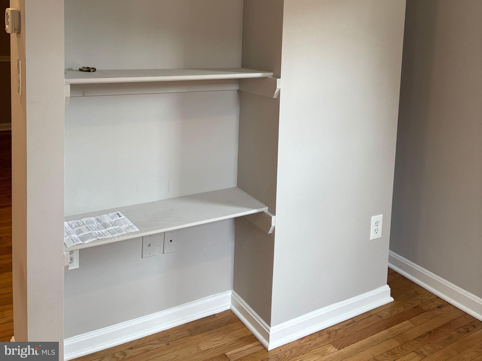 5126 Call Place Southeast Washington, DC 20019 - Photo 12 of 42 Built-in shelving in dining for storage or display