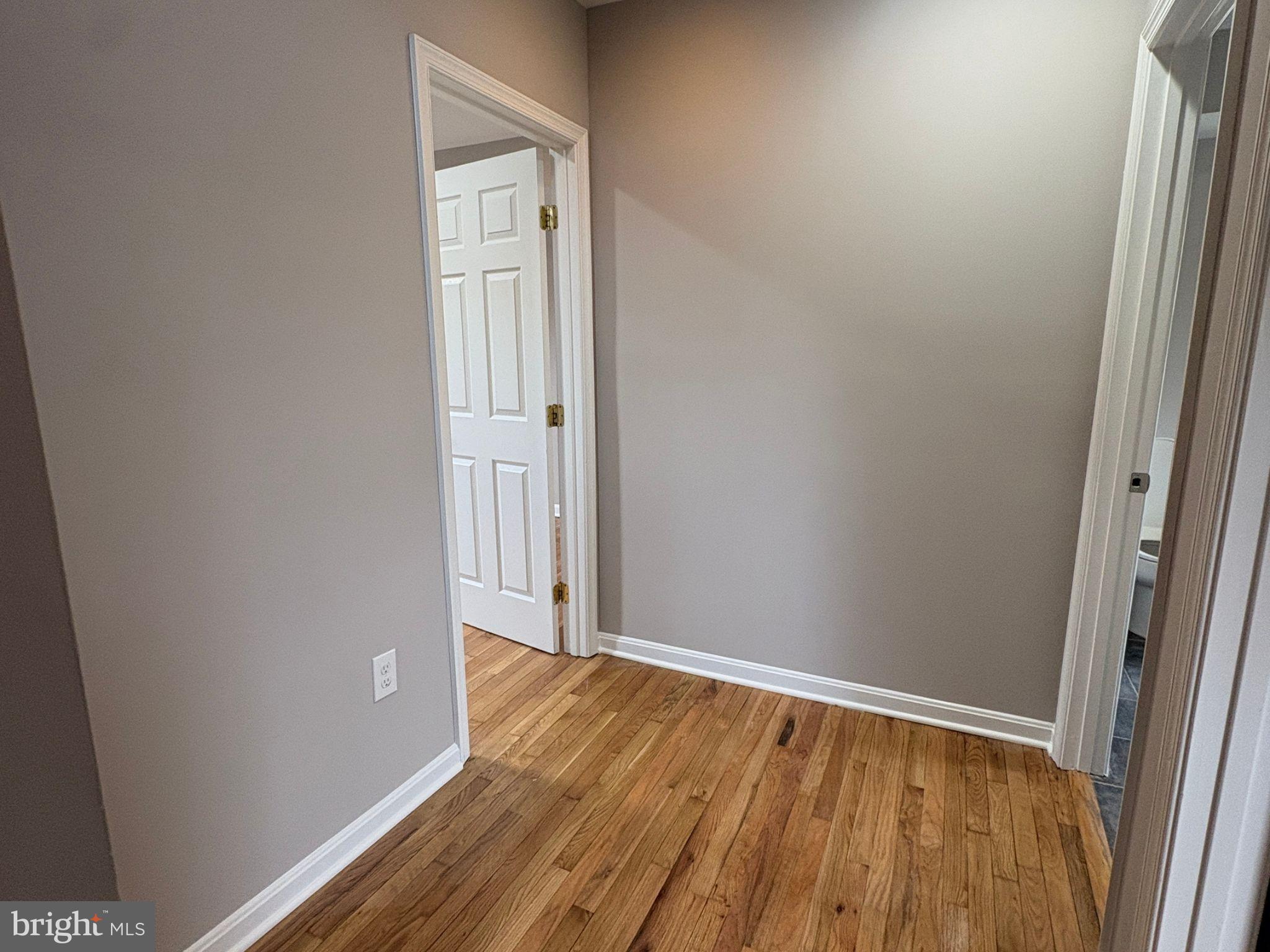 5126 Call Place Southeast Washington, DC 20019 - Photo 15 of 42 Upper level hallway connecting bedrooms & bathroom