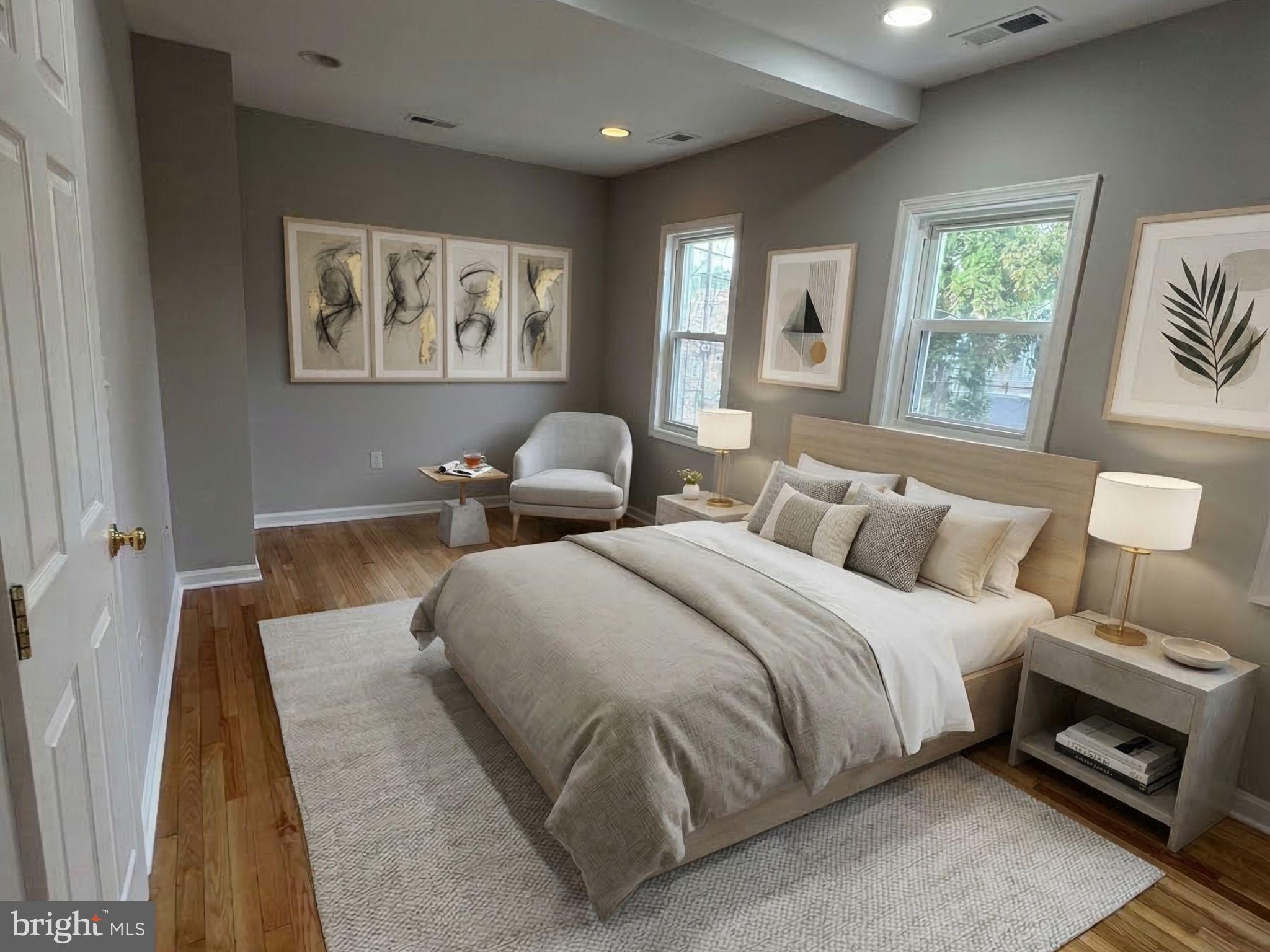 5126 Call Place Southeast Washington, DC 20019 - Photo 16 of 42 Virtually staged primary bedroom w/ hardwood floor