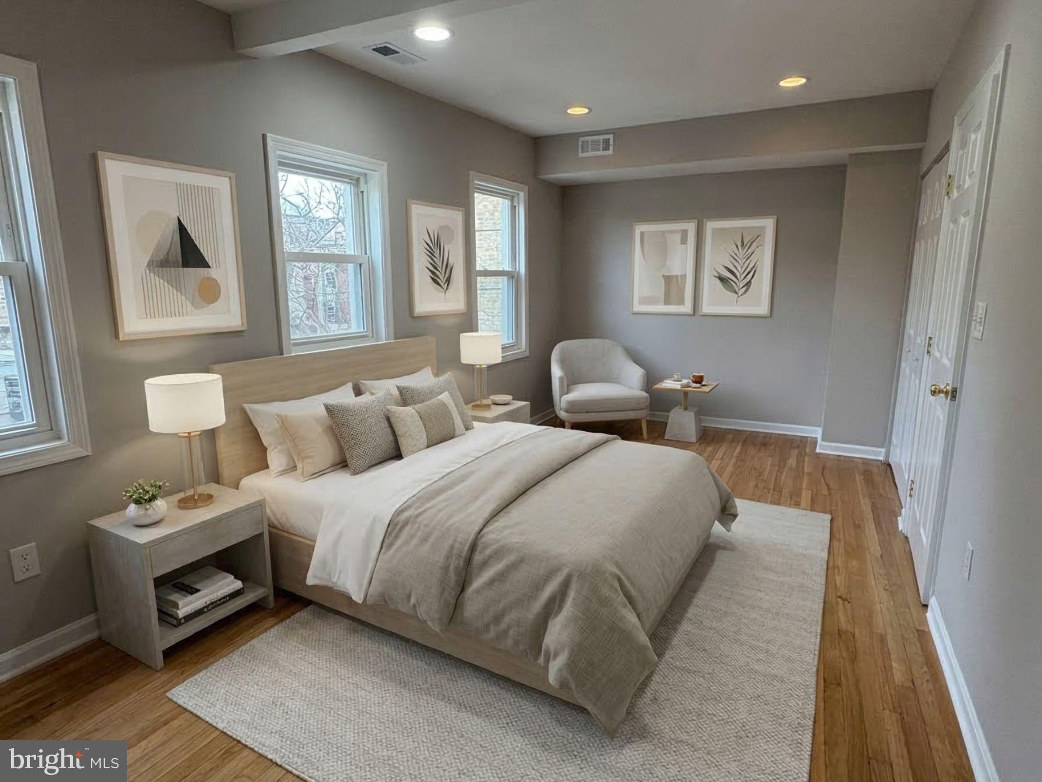 5126 Call Place Southeast Washington, DC 20019 - Photo 17 of 42 Virtually staged primary bedroom with hardwood