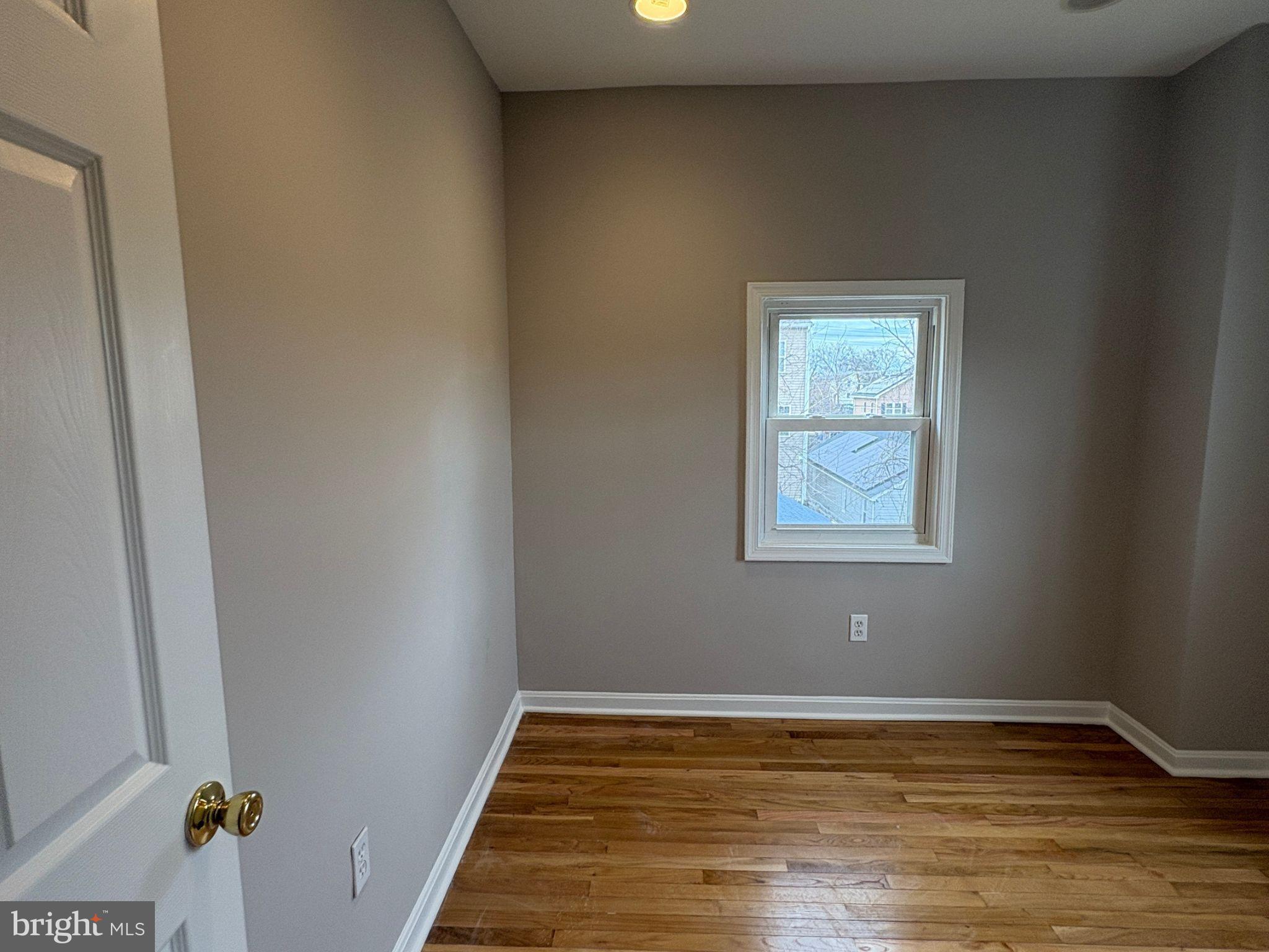 5126 Call Place Southeast Washington, DC 20019 - Photo 30 of 42 Bright and airy room with hardwood floors.