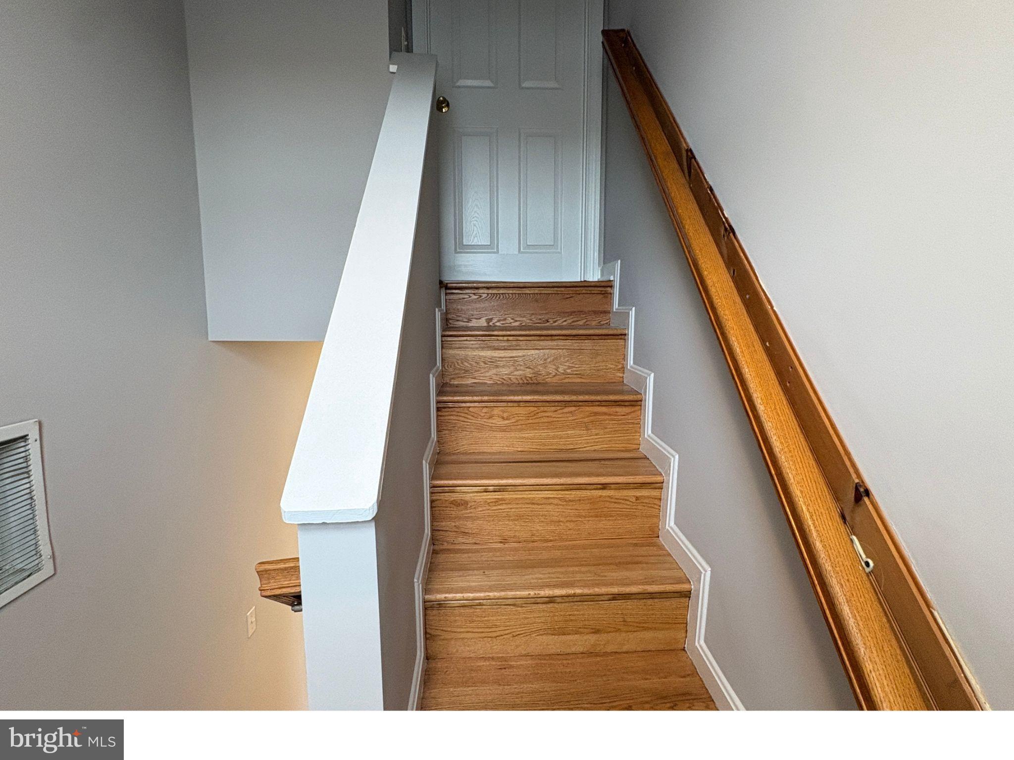 5126 Call Place Southeast Washington, DC 20019 - Photo 32 of 42 Hardwood staircase to upper level