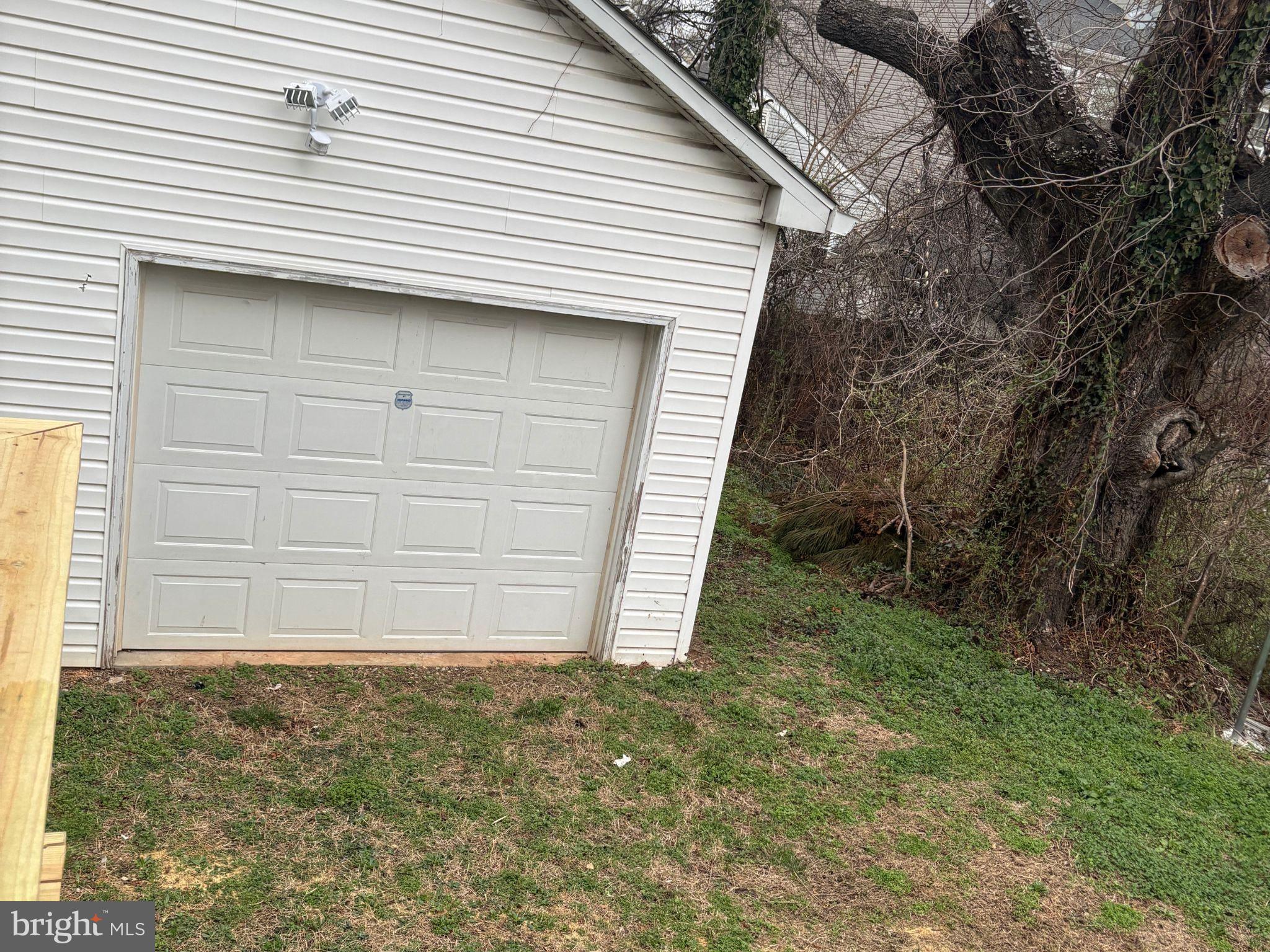 5126 Call Place Southeast Washington, DC 20019 - Photo 39 of 42 Detached garage with overhead door