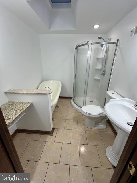 719 Taylor Drive Folcroft, PA 19032 - Photo 17 of 29 a bathroom with a toilet and a shower