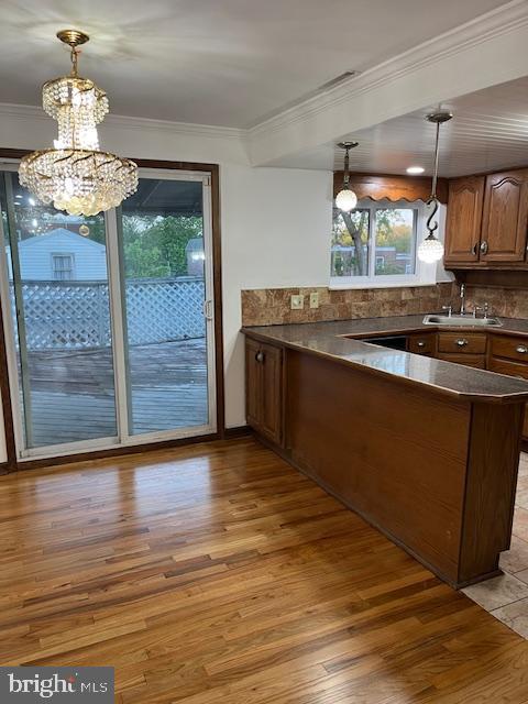 719 Taylor Drive Folcroft, PA 19032 - Photo 8 of 29 a kitchen with stainless steel appliances granite countertop a stove and a wooden cabinets